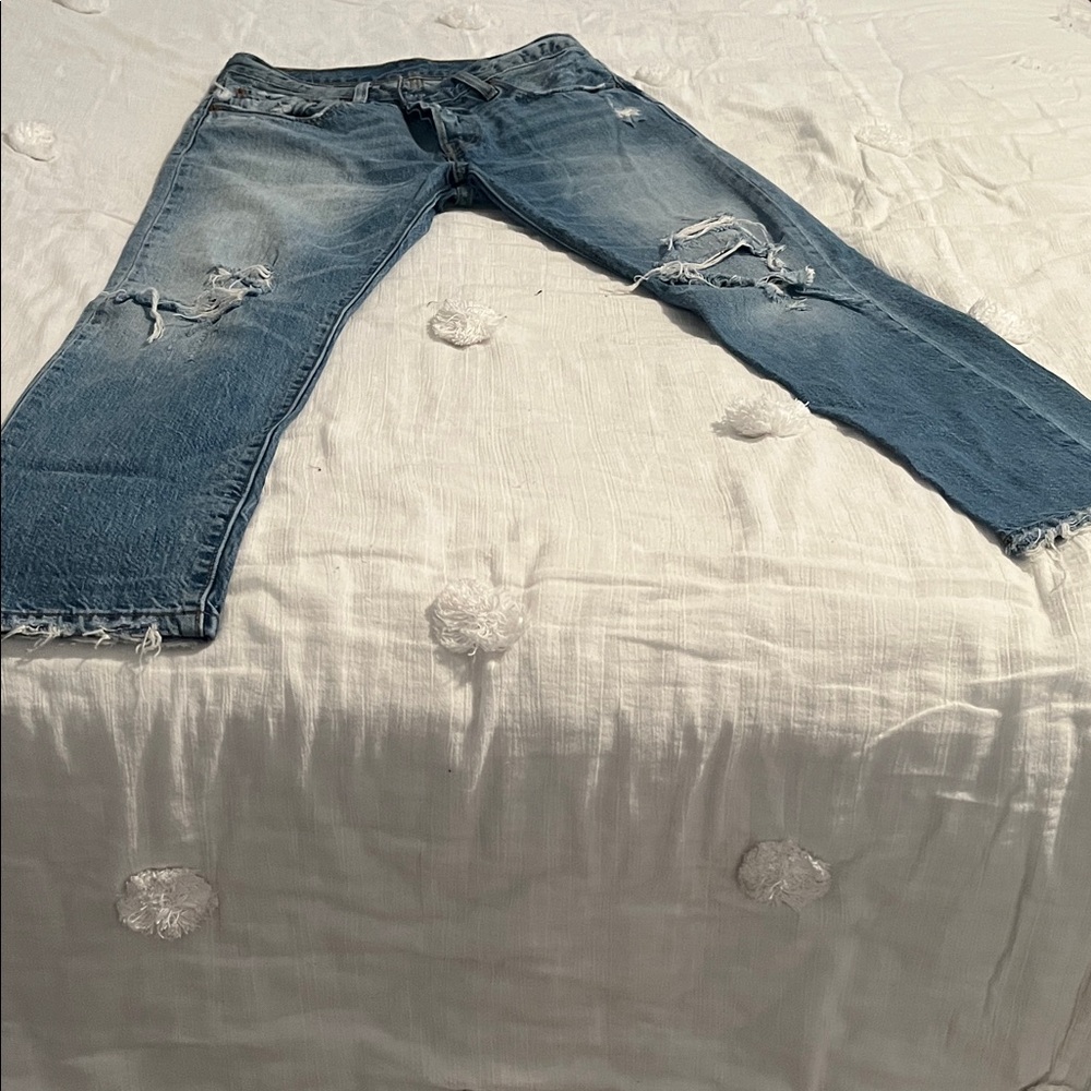 Levi’s distressed button up jeans